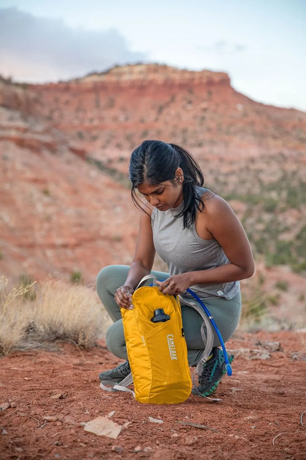 CamelBak Arete Sling 8 Hike Pack with 20oz Carry Cap Water Bottle